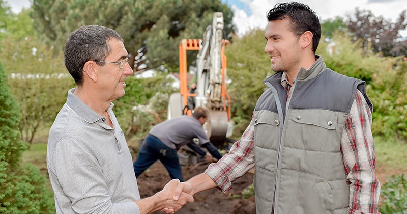 Landscape Manager Shaking Hands with Customer.